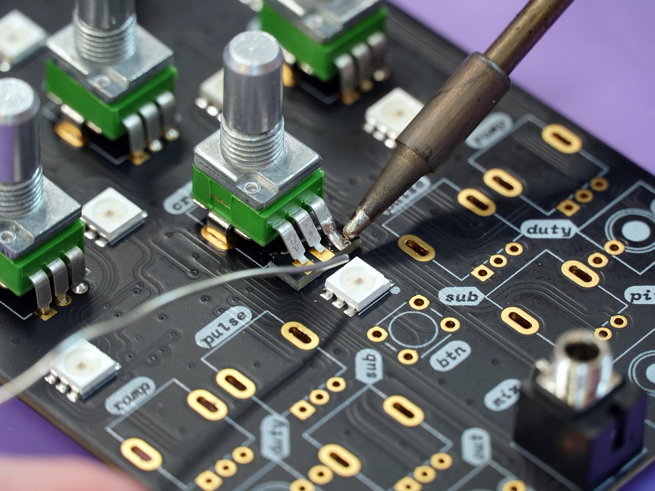 Close-up of electrical component soldering on a circuit board